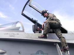 Strike Fighter Squadron (VFA) 27's Lt. Cmdr. Chris Rollins, from Whitwell, Tenn., has 18 months left in VFA 27 and plans to earn 600 Kitty Hawk traps before he leaves the squadron.  (U.S. Navy photo by JO1(SW/AW) Mark A. Savage)